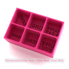Bright pink silicone ice cube tray with six customisable cube moulds, each designed to freeze unique words or phrases into ice, handmade in Australia.