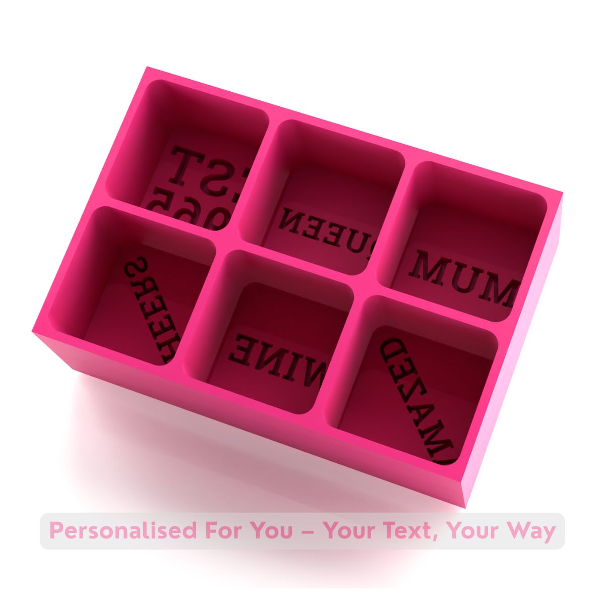 Pink handmade silicone ice tray with six cube spaces for personalised words, captioned “Your Text, Your Way.” A sweet and unique Mother’s Day gift.