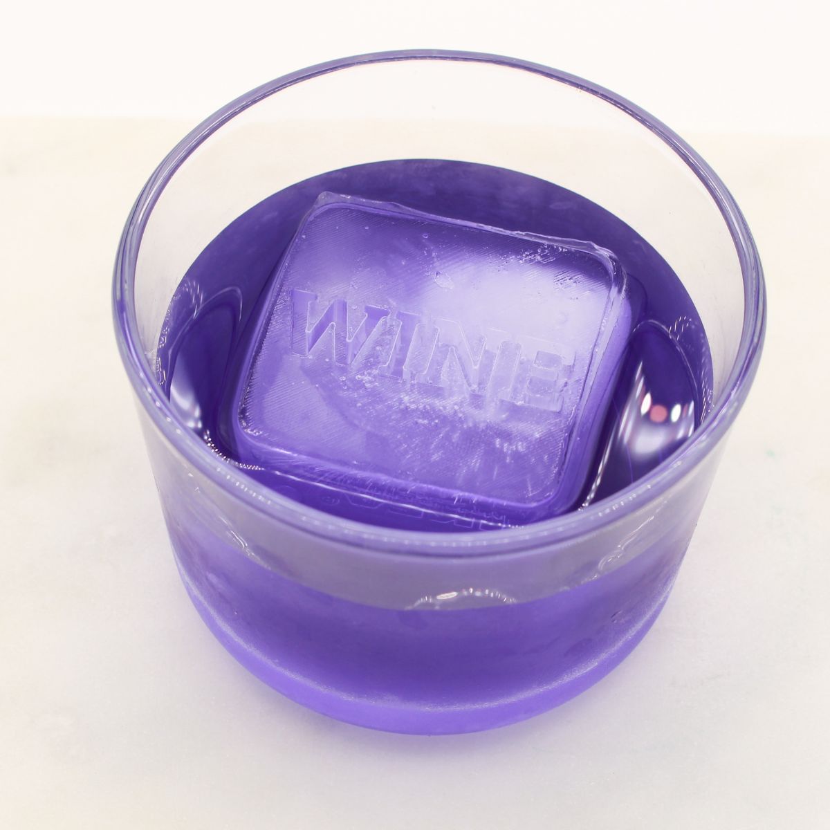 A cube etched with WINE, perfect for wine lovers, dinner parties, or quirky gifts. Handmade in Australia using premium platinum silicone.