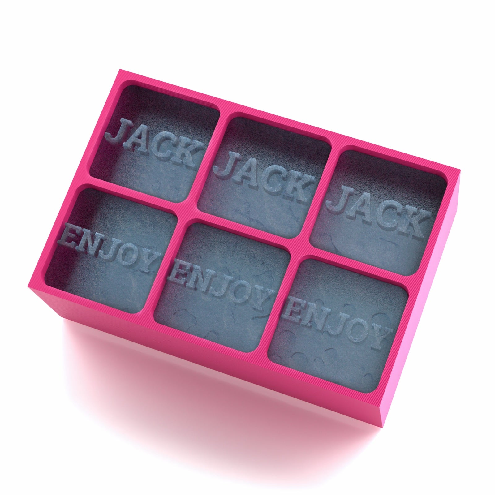 A pink 6-cube custom silicone ice tray featuring the words “JACK” and “ENJOY” embossed on the ice cubes, designed for personalised gifting or barware.