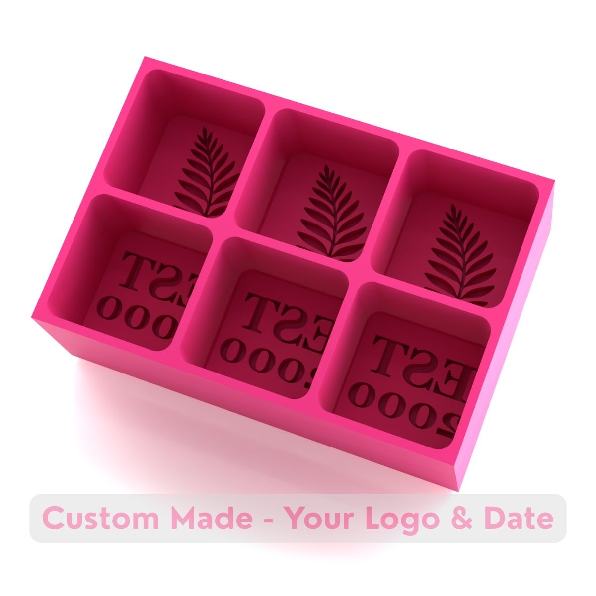 Pink silicone ice tray featuring decorative fern leaf design and EST 2000 custom date text for botanical ice cubes
