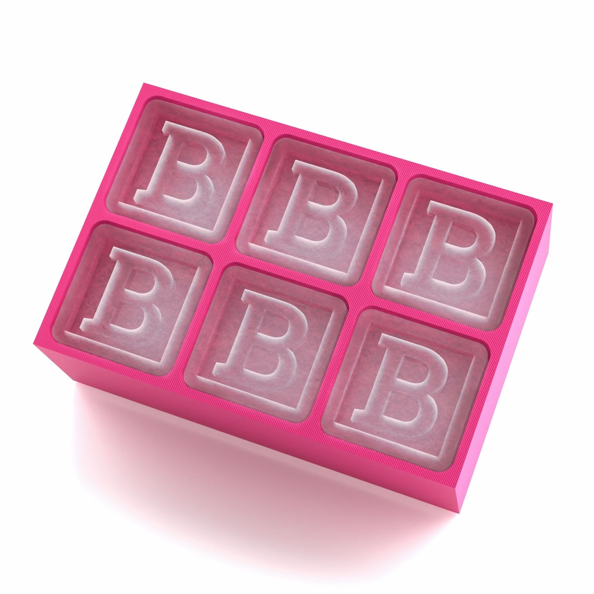 Pink silicone tray with signature B cubes – a thoughtful and playful gift for girls’ birthdays, events, and custom cocktails.