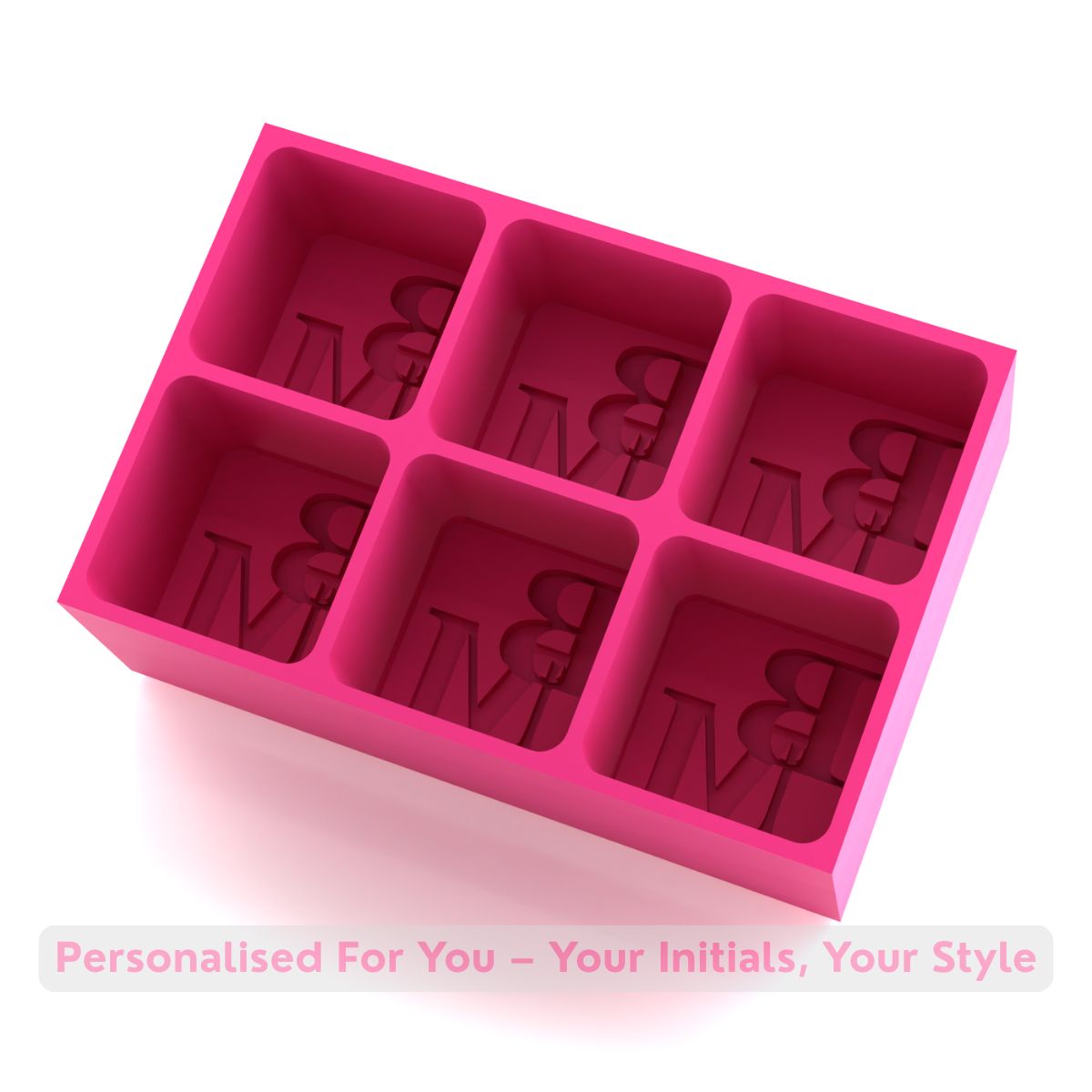 Bright pink silicone ice tray showing BM initials in six cube moulds, stylish personalised accessory handmade in Australia for unique home bars.