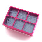 Soft pink custom ice tray with Wilson surname, family-first message, and engraved initials – a touching gift for close-knit family celebrations.