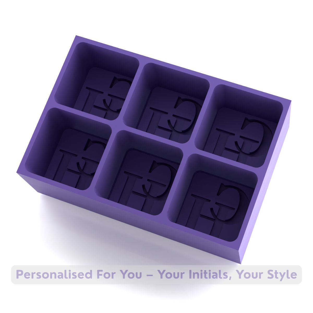 Handmade purple silicone ice tray with CH initials mould, producing stylish personalised ice cubes for gifts and special occasions.