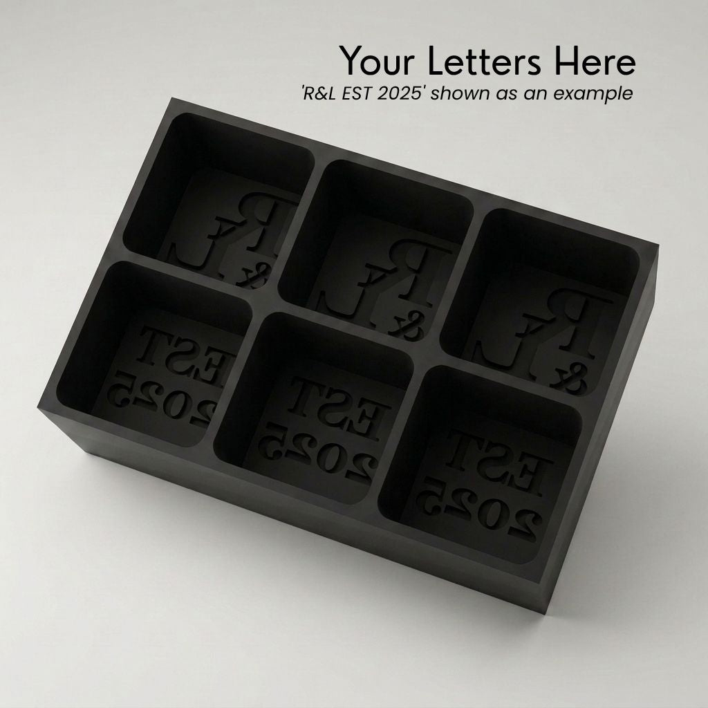 Charcoal grey R&L Est 2025 personalised silicone ice cube tray, top view of the monogram and EST 2025 embossed moulds