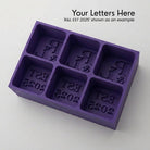 Purple R&L Est 2025 personalised silicone ice cube tray, top view of the monogram and EST 2025 embossed moulds