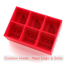 Red silicone ice cube tray with decorative fern leaf botanical design and EST 2000 custom establishment date