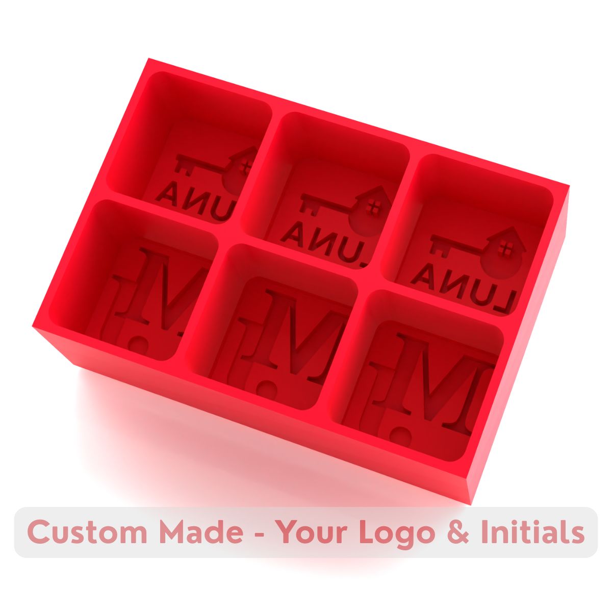 Bold red silicone ice tray moulding six custom cubes with initials and logo, designed as a unique gift or branded event accessory.