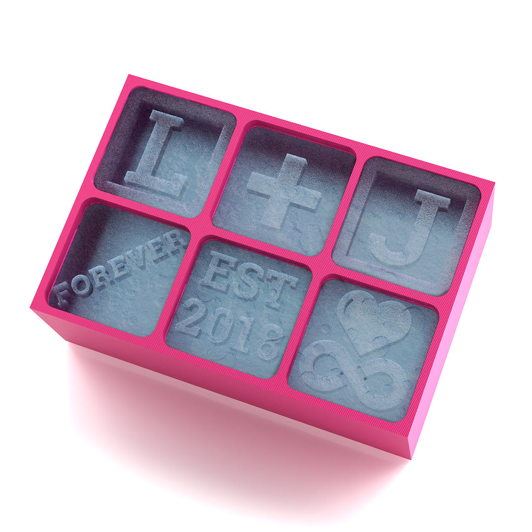 Pink custom silicone ice tray with engraved cubes spelling L+J, Forever, and heart-themed icons – perfect romantic gift.