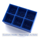 Reverse side of blue silicone ice mold showing mirrored custom text and logo cavities, personalized ice cube tray with your logo and establishment date