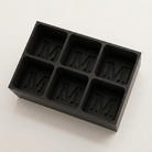 Black silicone Letter M ice cube tray, 6-cavity mould with bold monogram M design