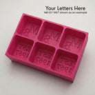 Pink monogrammed silicone ice cube tray, personalised with custom initials and established year