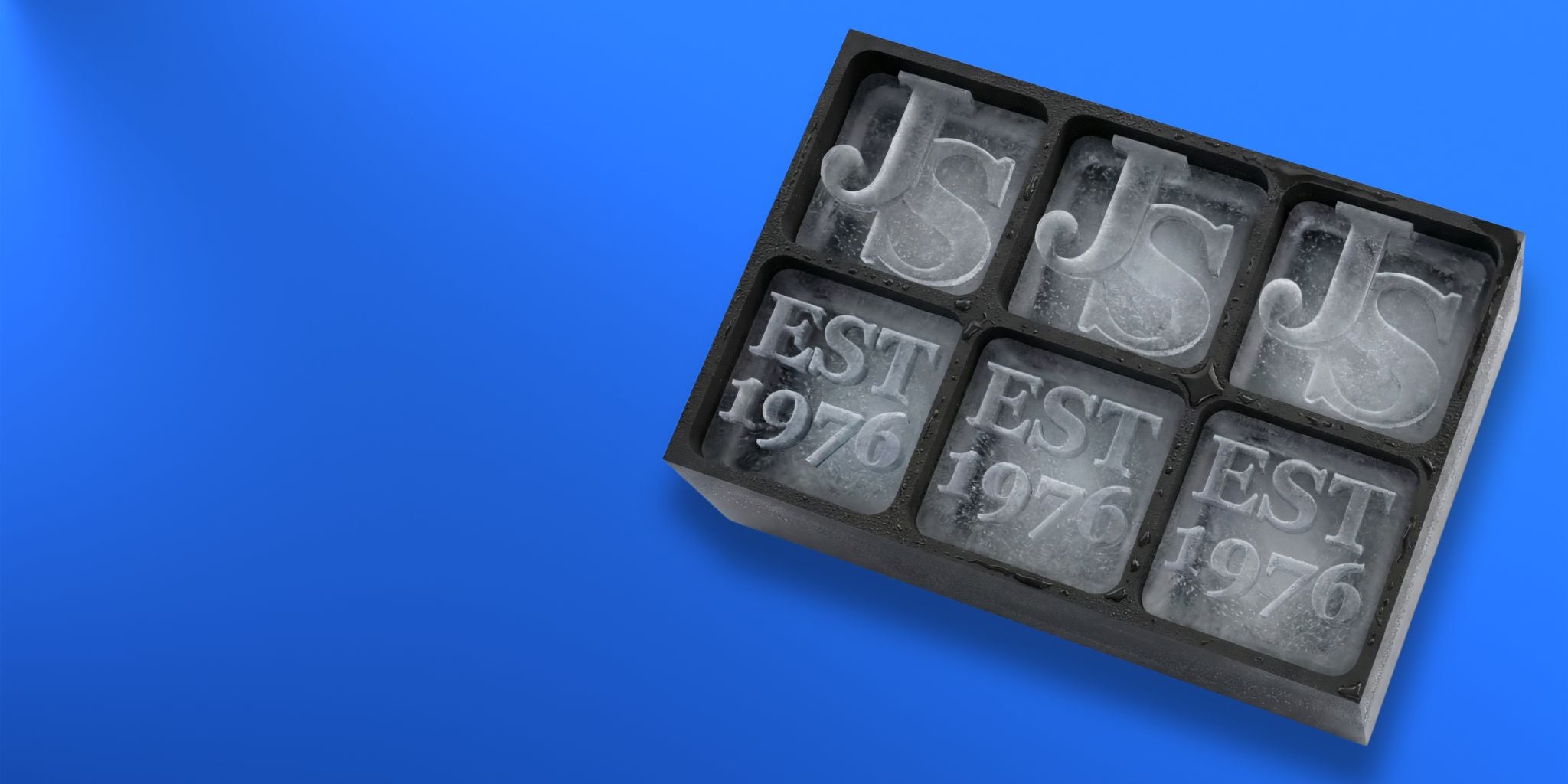Personalised monogram ice cube tray with JS initials and Est 1976 engraved in ice, blue silicone mold, custom gift for him